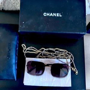 Chanel Sunglasses with chain, cover and original box. perfect condition